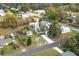 Aerial view of a beautiful home with a long drive surrounded by lush greenery at 1290 S Mcadoo Ave, Bartow, FL 33830