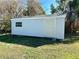 Backyard shed with siding, window and a single entry door at 1290 S Mcadoo Ave, Bartow, FL 33830