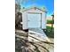 Exterior of a backyard shed with a roll up door and entry ramp at 1290 S Mcadoo Ave, Bartow, FL 33830