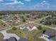 Bird's eye view features large lot, screen enclosed lanai, and beautiful neighborhood at 1301 Hidden Creek Ct, Winter Haven, FL 33880