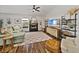 Cozy living room featuring a fireplace, comfortable seating, and stylish decor at 1301 Hidden Creek Ct, Winter Haven, FL 33880