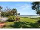 Waterfront home features large backyard and scenic water views at 14 Lake Hollingsworth Dr, Lakeland, FL 33803