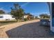 Gravel yard with view of surrounding neighborhood, a low-maintenance space that offers simplicity and practicality at 140 Jackson Park Ave, Davenport, FL 33897