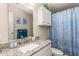 Bathroom featuring a sink with a granite countertop and a cabinet at 140 Jackson Park Ave, Davenport, FL 33897