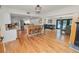 Modern kitchen open to living area featuring a kitchen island with seating and access to a backyard pool at 1401 Easton Dr, Lakeland, FL 33803