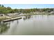 A serene lake view of the park with benches and walking areas at 1401 Easton Dr, Lakeland, FL 33803