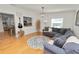 Cozy living room with a stylish sofa and view into the open kitchen at 1401 Easton Dr, Lakeland, FL 33803