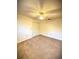 Bedroom features neutral walls, carpeting, and a ceiling fan at 1880 N Crystal Lake Dr # 28, Lakeland, FL 33801