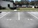 Reserved parking spaces in a well-maintained parking lot area at 1880 N Crystal Lake Dr # 28, Lakeland, FL 33801