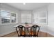 Dining room is lit with natural light from windows with white wood blinds at 1957 Prairie Dunes N Cir, Lakeland, FL 33810