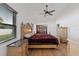 Main bedroom with ensuite bathroom and walk in closet at 1957 Prairie Dunes N Cir, Lakeland, FL 33810