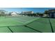 Outdoor tennis courts, fully fenced and adjacent to the community clubhouse and pool area at 1957 Prairie Dunes N Cir, Lakeland, FL 33810