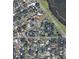 Aerial view showcases neighborhood with a pond at 2015 E Beacon By Way, Lakeland, FL 33803