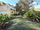 Spacious back yard with mature trees and landscaping at 2015 E Beacon By Way, Lakeland, FL 33803