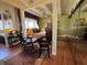 Bedroom with exposed ceiling beams and a cozy layout that includes a seating area and a mirrored wardrobe at 2015 E Beacon By Way, Lakeland, FL 33803