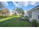 Spacious backyard with a lush lawn and well-maintained landscaping at 2038 Winterset Dr # 2038, Lakeland, FL 33813