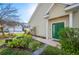 Home exterior showcasing mature landscaping and a welcoming front entrance at 2038 Winterset Dr # 2038, Lakeland, FL 33813