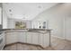 Kitchen with stainless steel appliances and an open layout leading into the dining and living areas at 2038 Winterset Dr # 2038, Lakeland, FL 33813