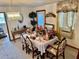 Elegant dining room with vintage decor, chandelier, and window at 209 Ann Ave, Dundee, FL 33838