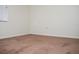 Bedroom with hardwood floors, natural light from window, and neutral paint at 2111 Groveglen S Ln, Lakeland, FL 33813