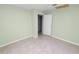 Bedroom featuring neutral walls and an entry door at 2305 State Road 33 Hwy, Clermont, FL 34714