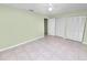 Bedroom featuring neutral walls and two closets providing ample storage space at 2305 State Road 33 Hwy, Clermont, FL 34714