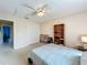 Comfortable bedroom with ceiling fan, storage closet and easy access to en-suite bath at 2532 Everleth Dr, Lakeland, FL 33810