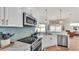 Kitchen featuring marble countertops, stainless steel appliances, and modern fixtures at 2917 Blackwater Creek Dr, Lakeland, FL 33810