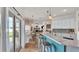 Kitchen featuring marble countertops, an eat-in bar, stainless steel appliances, and a sliding glass door at 2917 Blackwater Creek Dr, Lakeland, FL 33810