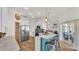 Kitchen featuring marble countertops, an eat-in bar, stainless steel appliances, and an eat-in nook at 2917 Blackwater Creek Dr, Lakeland, FL 33810