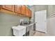 Well-organized laundry room with modern washer and dryer and ample storage at 2917 Blackwater Creek Dr, Lakeland, FL 33810