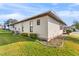 The exterior of this home is accentuated by well-maintained siding and tidy landscaping at 3203 Bear Creek Ln, Lakeland, FL 33810