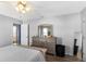 Spacious main bedroom featuring wood-look floors and a ceiling fan, providing a comfortable retreat at 3203 Bear Creek Ln, Lakeland, FL 33810