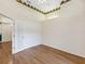 Bright bedroom with hardwood floors, a french door, and high ceilings at 324 Lake Mariam Blvd, Winter Haven, FL 33884