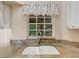 Close-up of the kitchen sink and window overlooking the outdoors at 324 Lake Mariam Blvd, Winter Haven, FL 33884