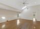 Spacious living room with hardwood floors, skylights, and ample natural light at 324 Lake Mariam Blvd, Winter Haven, FL 33884