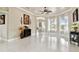 Open-concept living room with elegant decor and abundant natural light at 335 Osprey Landing Way, Lakeland, FL 33813