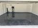 Garage featuring epoxy flooring and ample space at 362 Pasco Ct, Winter Haven, FL 33884