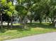 Spacious grassy lot with mature trees at 362 Pasco Ct, Winter Haven, FL 33884