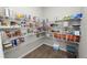 Organized walk-in pantry with metal shelving for ample storage at 3862 Willow Ridge Dr, Lakeland, FL 33810