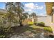 Backyard with grass and fence at 3901 Oak Loop # 33, Mulberry, FL 33860