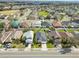 Aerial view of the house, the driveway and the nicely manicured lawn at 3961 Hampton Hills W Dr, Lakeland, FL 33810