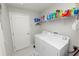 Laundry room with a washing machine and a dryer at 3961 Hampton Hills W Dr, Lakeland, FL 33810