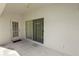 Covered patio with a sliding glass door and a door with window at 3961 Hampton Hills W Dr, Lakeland, FL 33810