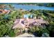 Stunning aerial view of estate with lush landscaping and community pool at 4002 Sunset Lake Dr, Lakeland, FL 33810