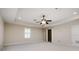 Bright bonus room featuring neutral walls, plush carpet, and large windows at 4002 Sunset Lake Dr, Lakeland, FL 33810