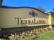 Terra Largo community sign with landscaping in front and a blue sky above on a sunny day at 4002 Sunset Lake Dr, Lakeland, FL 33810