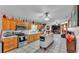 Spacious kitchen with stainless steel appliances and large tile flooring at 4035 Crews Ln, Lakeland, FL 33813