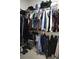 Closet is full of an assortment of clothes, bags, and shoes ready to be worn and enjoyed at 4080 Prima Lago Cir, Lakeland, FL 33810