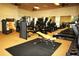 A fully-equipped gym featuring machines, free weights, and cardio equipment for residents' fitness needs at 4080 Prima Lago Cir, Lakeland, FL 33810